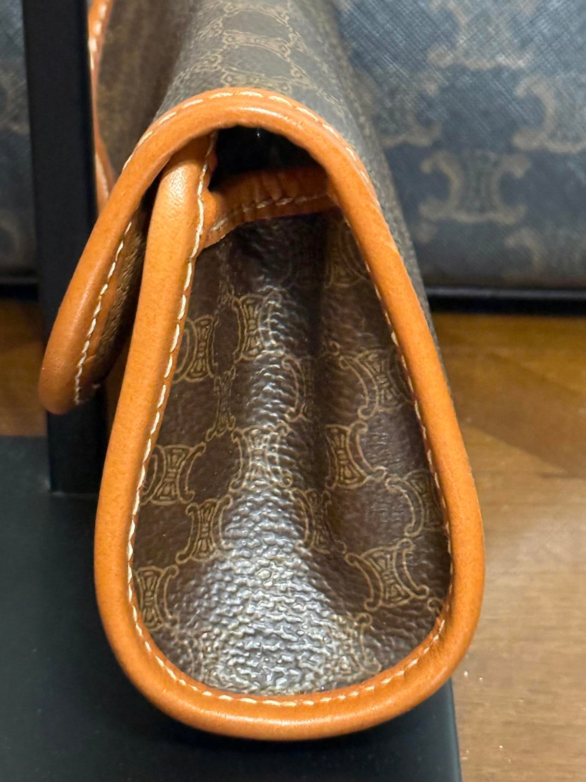 Celine Triomphe vintage leather trimmed clutch bag