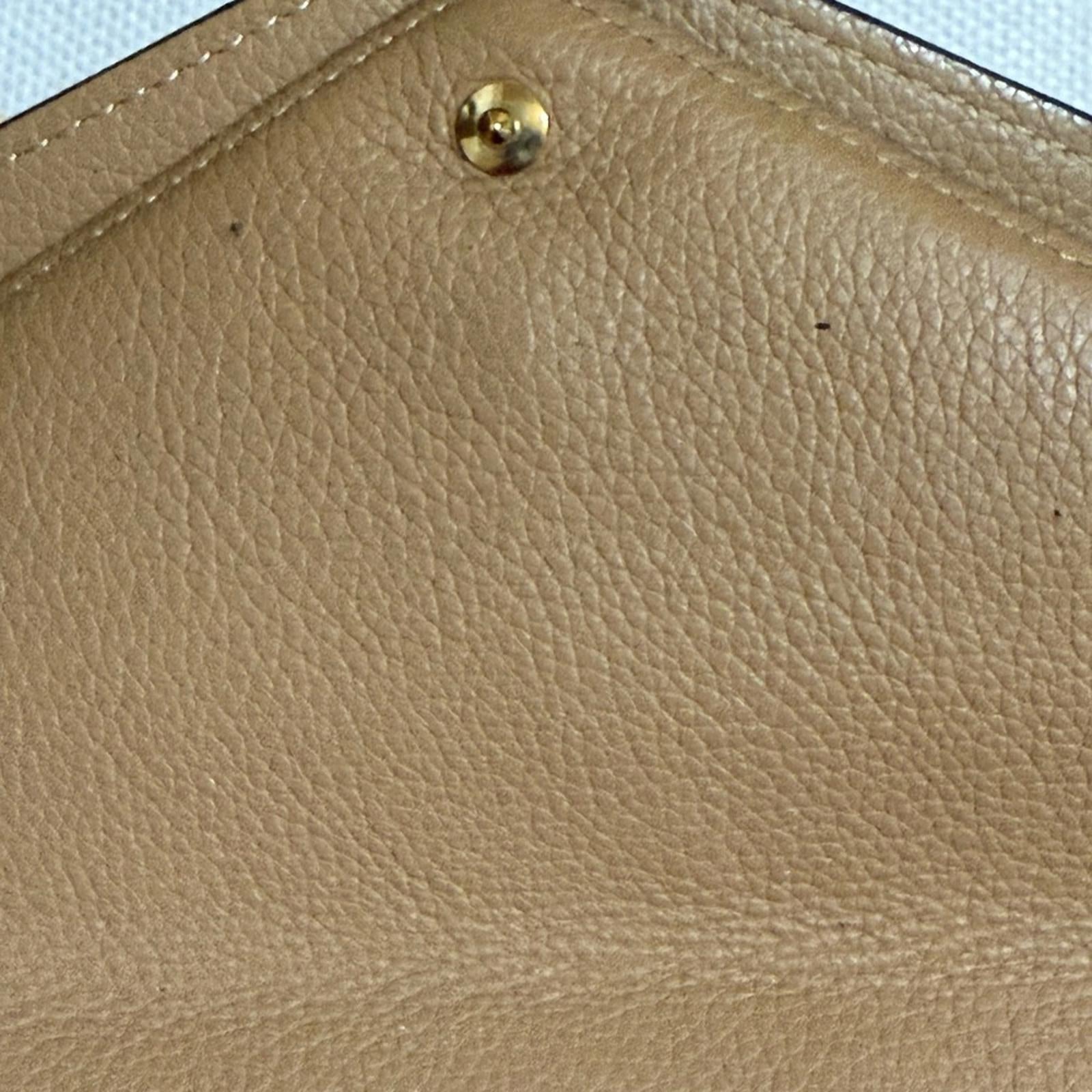 Louis Vuitton Double V Sesame Grained Leather Wallet