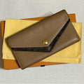 Louis Vuitton Double V Sesame Grained Leather Wallet