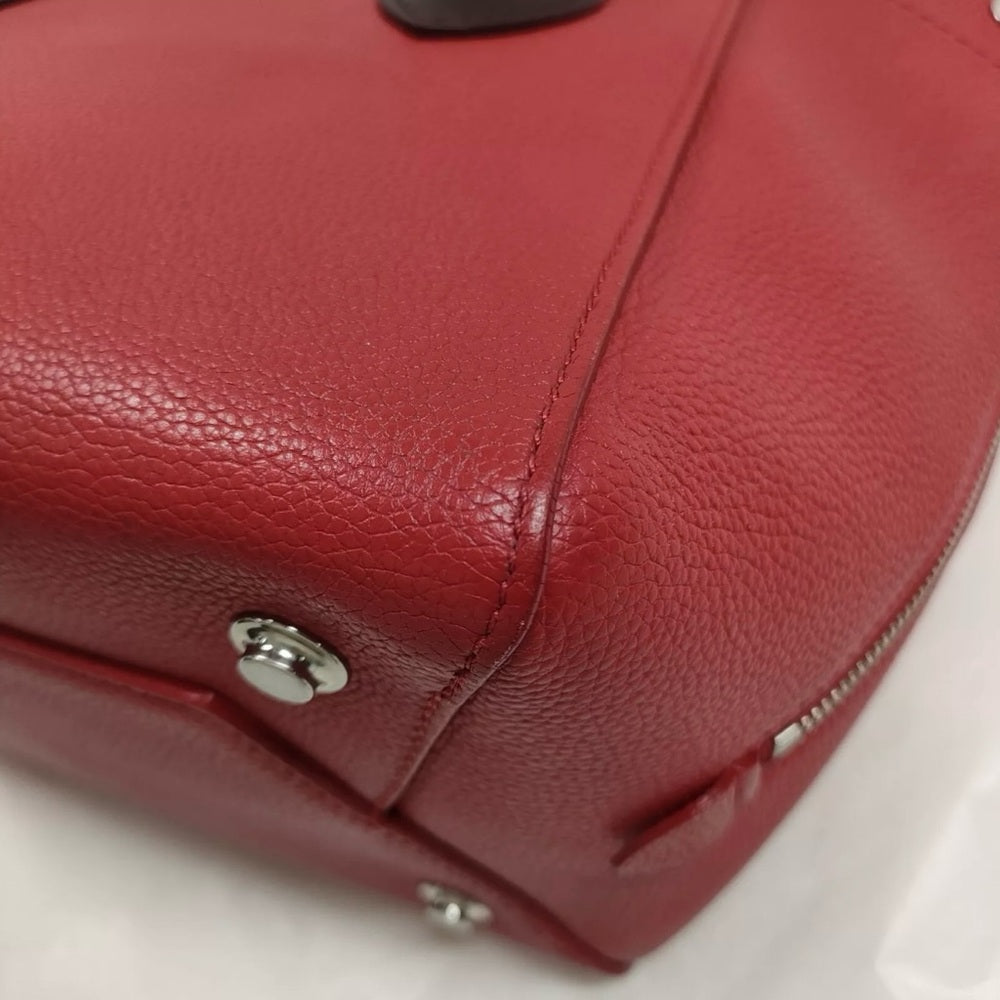 Louis Vuitton Freedom Bag in Red Calfskin Leather