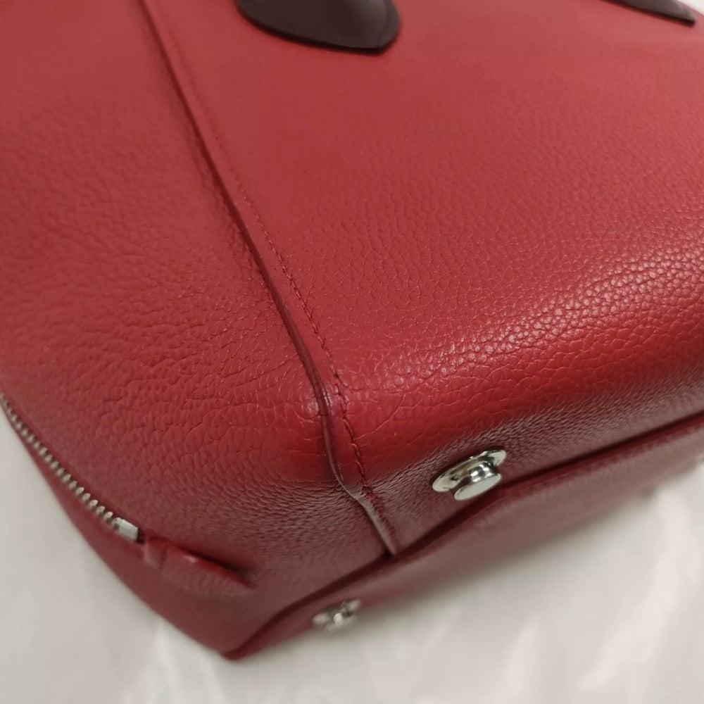 Louis Vuitton Freedom Bag in Red Calfskin Leather