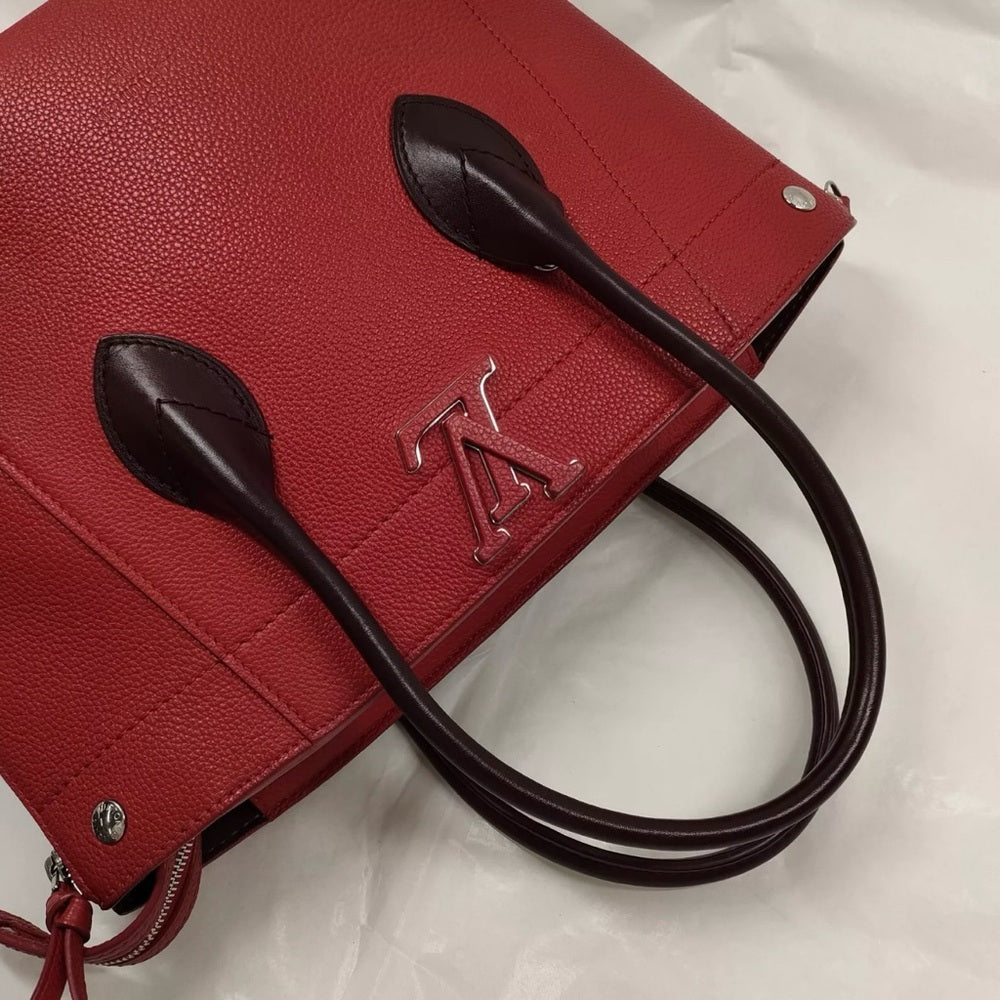 Louis Vuitton Freedom Bag in Red Calfskin Leather