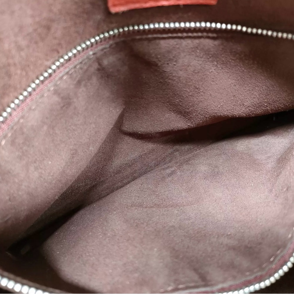 Louis Vuitton Freedom Bag in Red Calfskin Leather