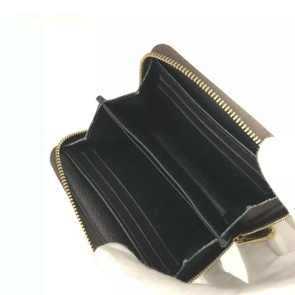 Louis Vuitton Reverse Monogram Zippy Wallet