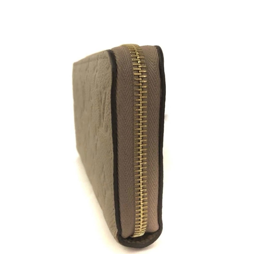 Louis Vuitton Tourterelle Monogram Zippy Wallet