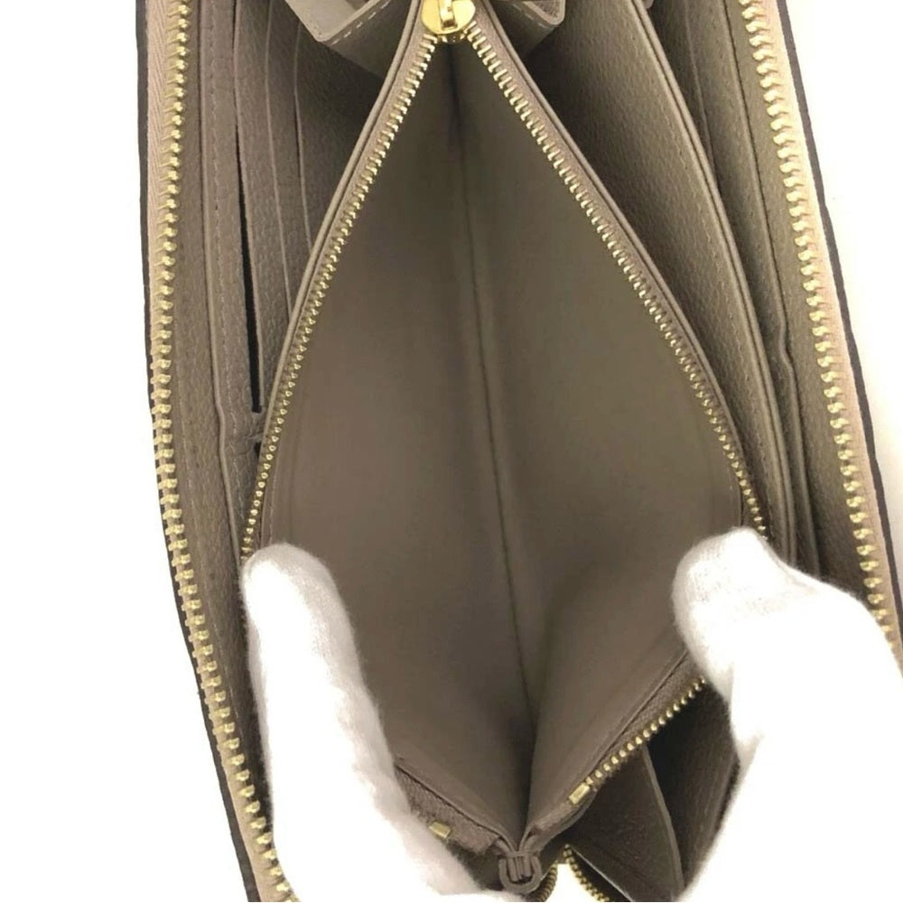 Louis Vuitton Tourterelle Monogram Zippy Wallet