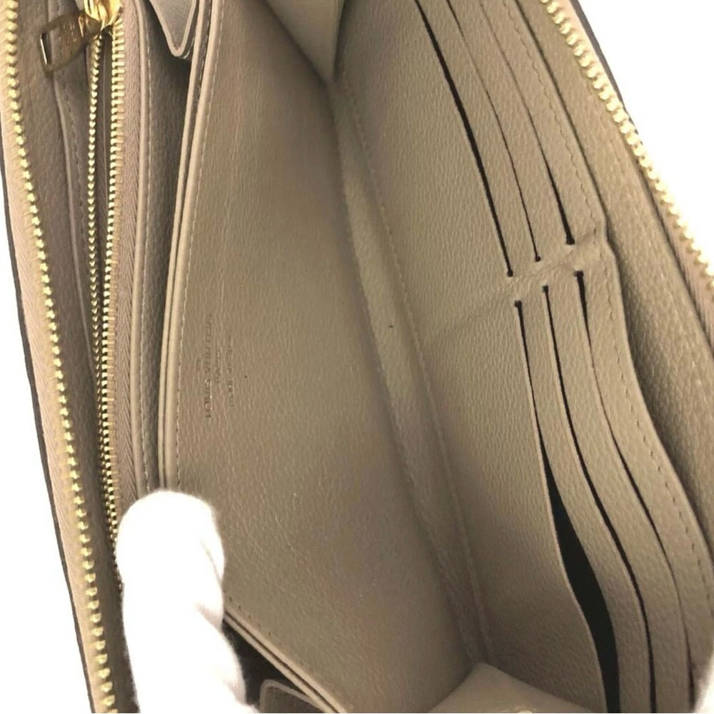 Louis Vuitton Tourterelle Monogram Zippy Wallet