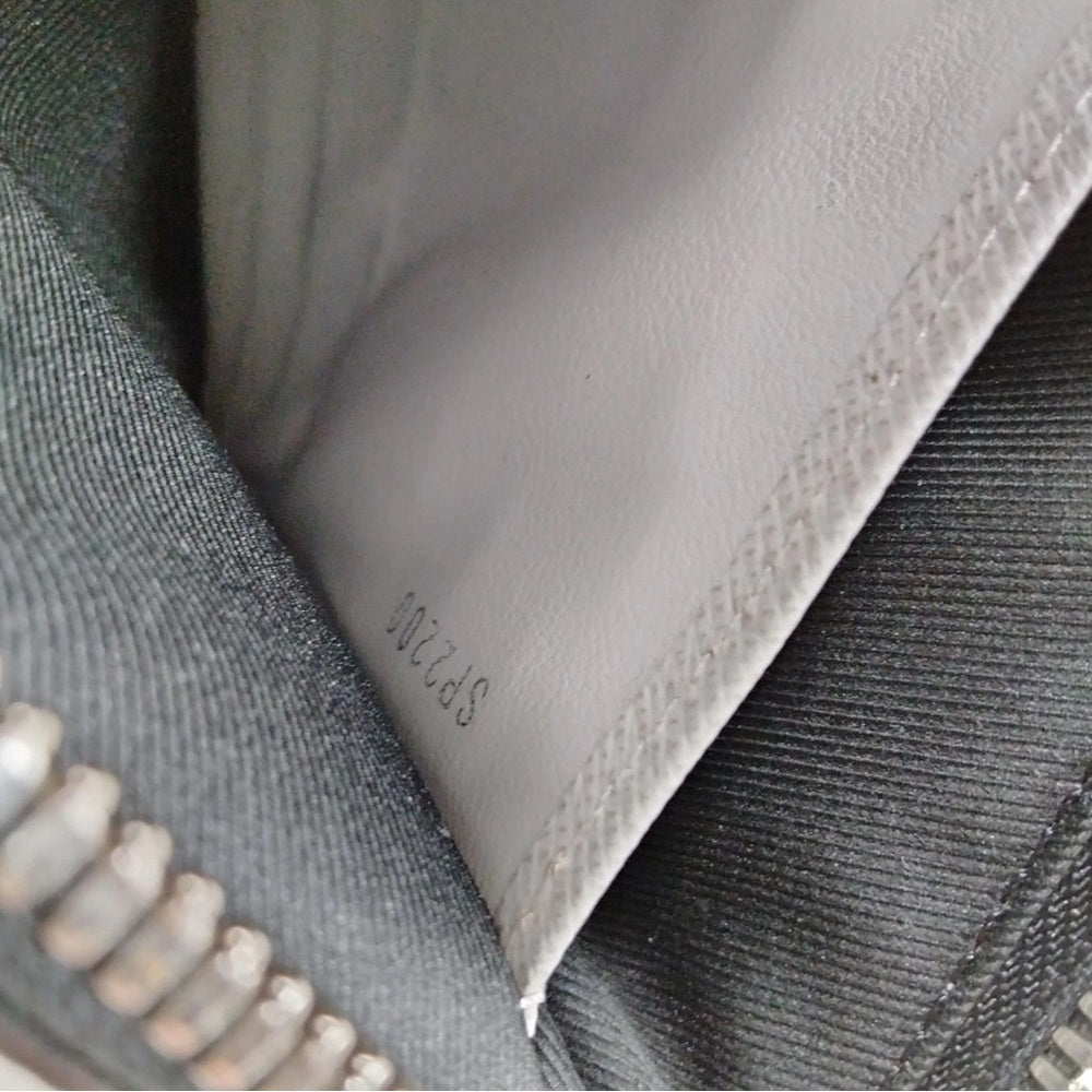 Louis Vuitton Taigarama Discovery PM Monogram Pochette