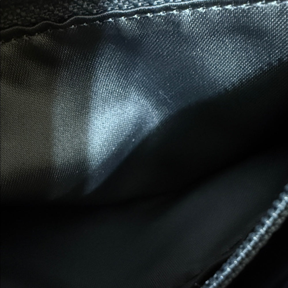 CHANEL Black Lambskin Camellia Embossed Long Bifold Wallet